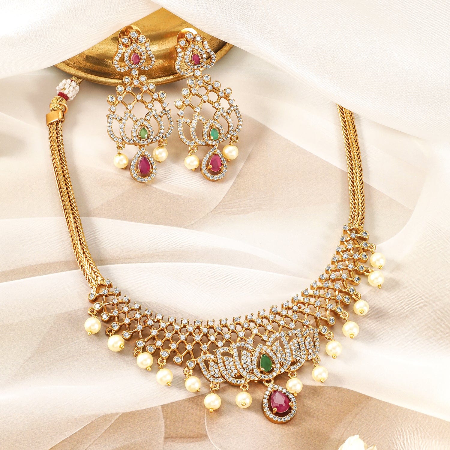 22k-gold-plated-ruby-emerald-cz-studded-lotus-motif-jewellery-set-with-pearl-drop-necklace-set-37009972986030.jpg