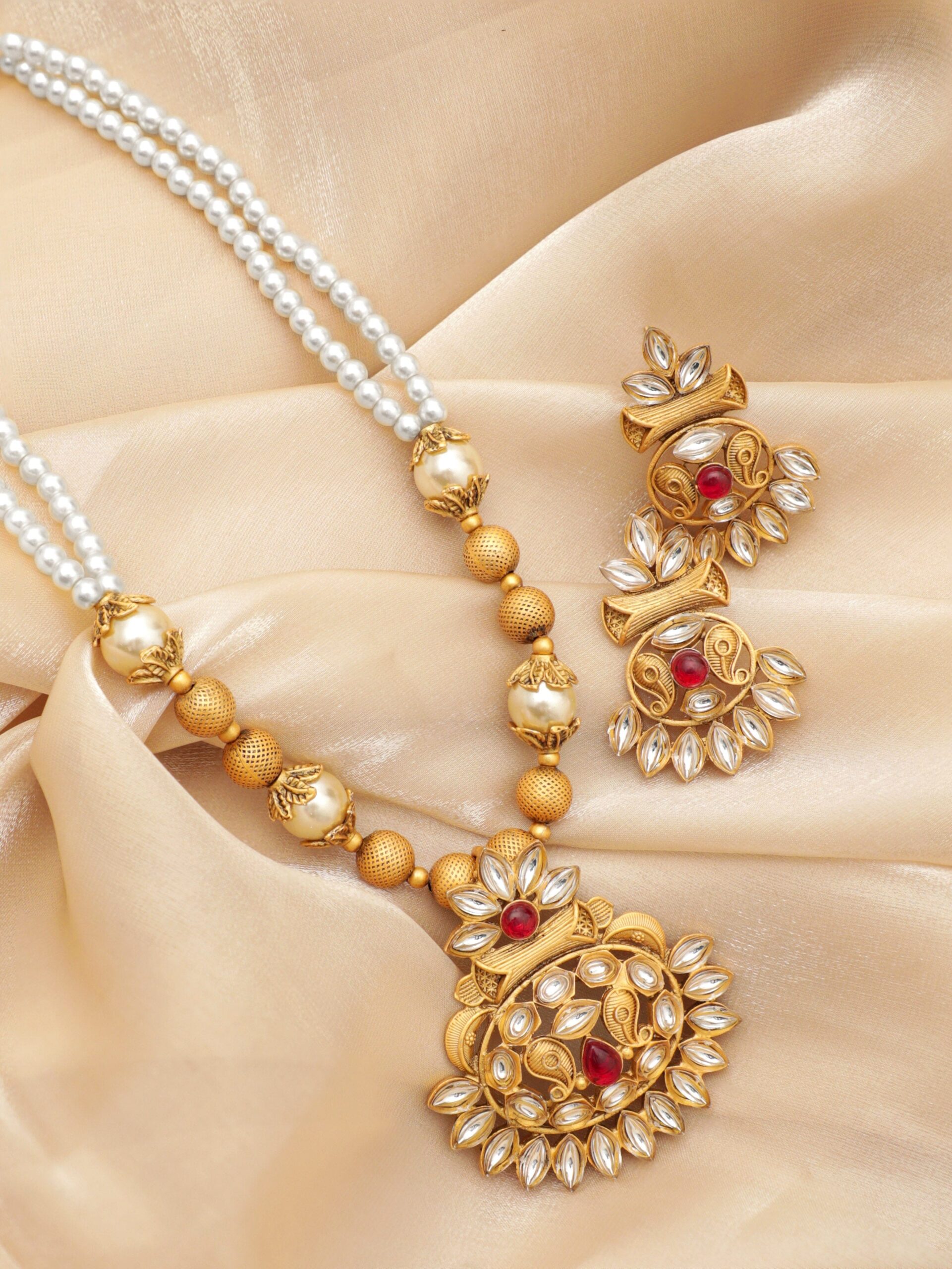 gold-colored-pendant-necklace-set-with-white-beads-and-small-stones-jewellery-sets-34472217837742.jpg