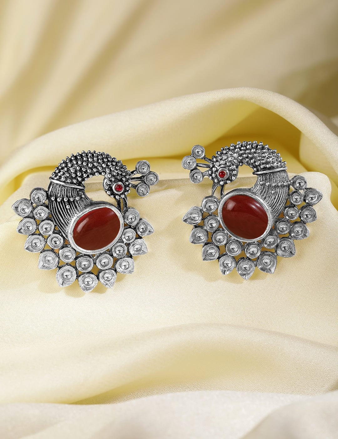 oxidized-silver-plated-peacock-motif-stud-earrings-with-ruby-studded-studs-36940896927918.jpg