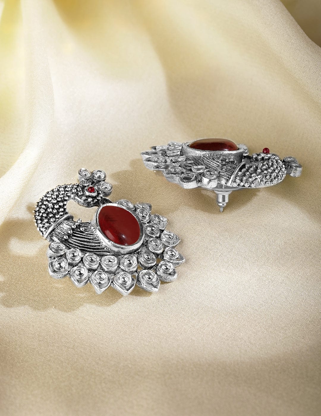 oxidized-silver-plated-peacock-motif-stud-earrings-with-ruby-studded-studs-36940896960686.jpg
