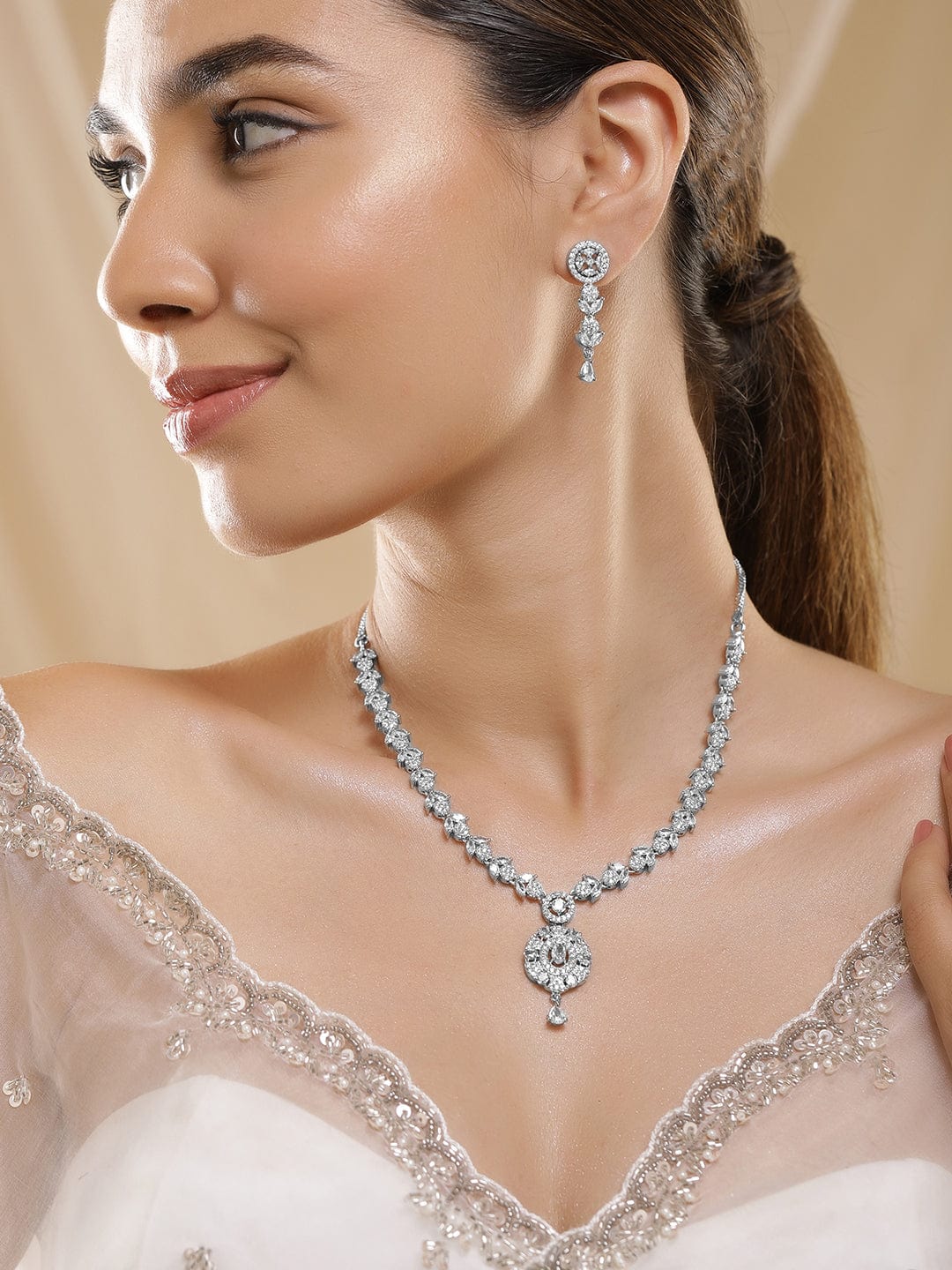 premium-rhodium-plated-white-cubic-zirconia-studded-necklace-set-with-floral-design-necklace-set-37193723805870.jpg