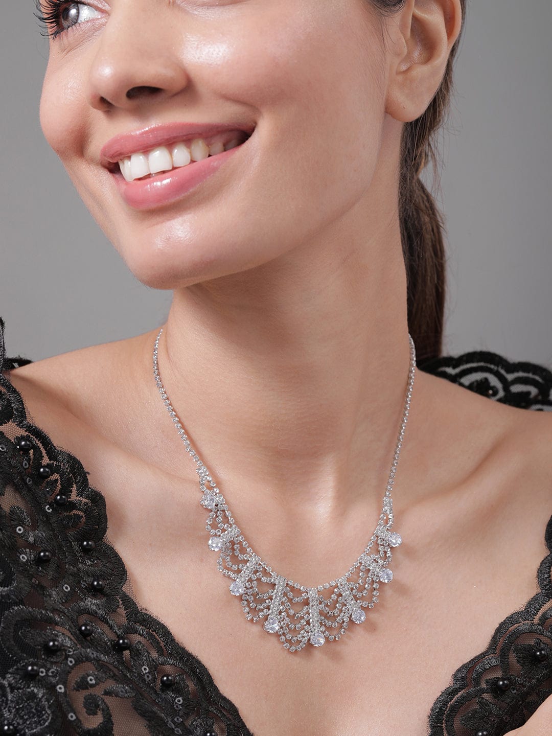 rhodium-plated-ad-cubic-zirconia-studded-luxurious-draped-statement-necklace-necklace-36992417431726.jpg
