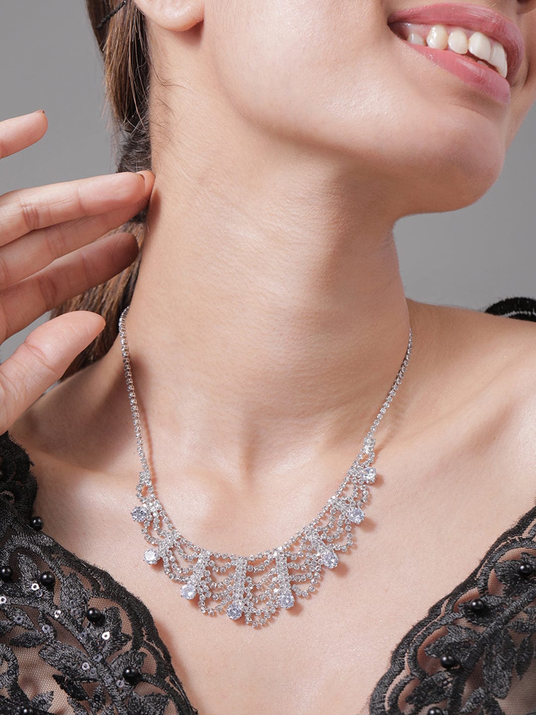 rhodium-plated-ad-cubic-zirconia-studded-luxurious-draped-statement-necklace-necklace-36992417464494.jpg