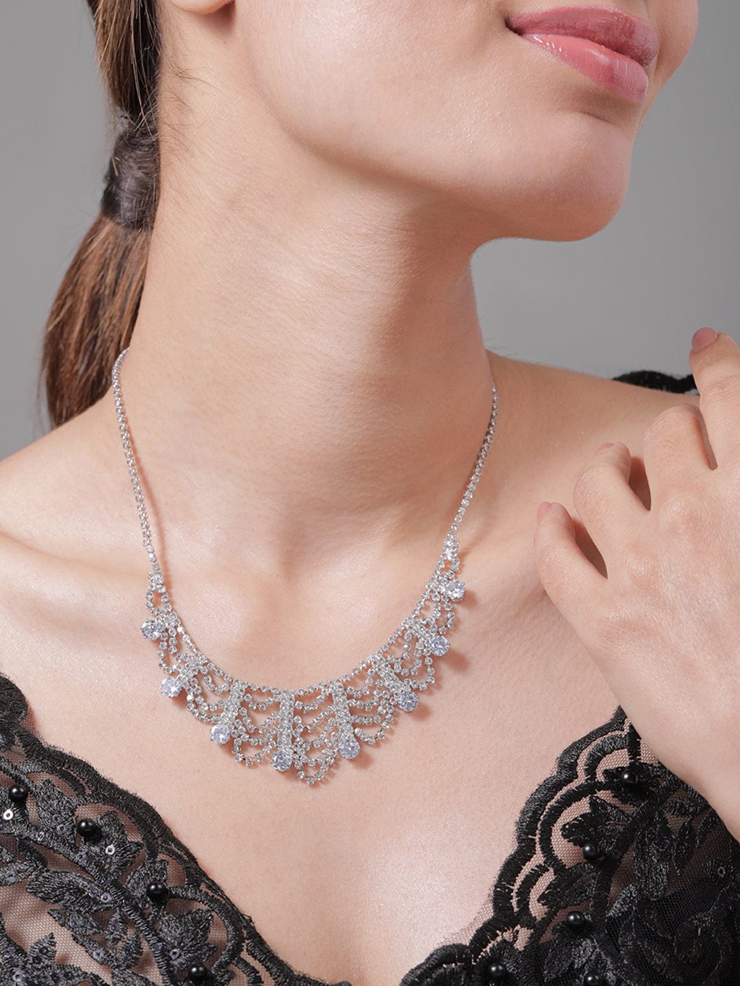 rhodium-plated-ad-cubic-zirconia-studded-luxurious-draped-statement-necklace-necklace-36992417497262.jpg