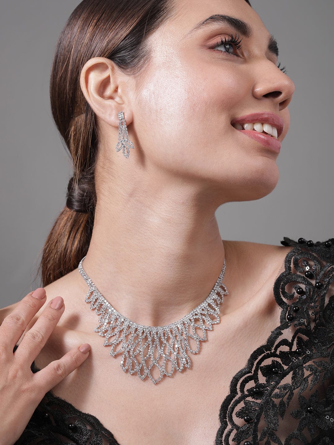 rhodium-plated-ad-cubic-zirconia-studded-luxurious-leaf-motif-necklace-set-necklace-and-earrings-36992310739118.jpg