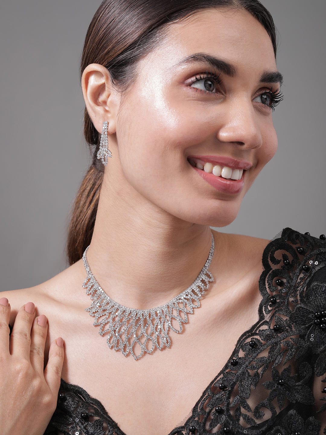 rhodium-plated-ad-cubic-zirconia-studded-luxurious-leaf-motif-necklace-set-necklace-and-earrings-36992310804654.jpg
