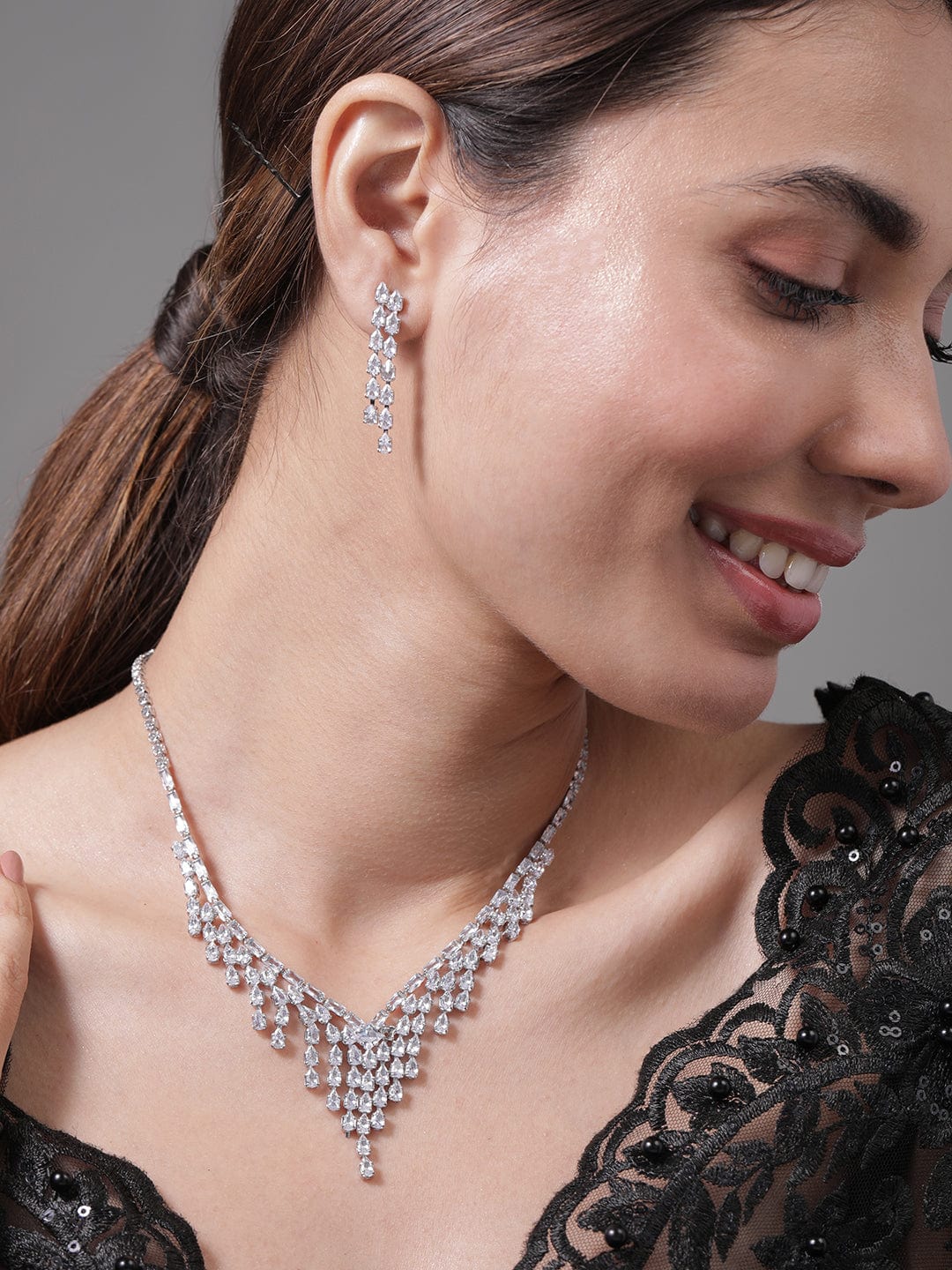 rhodium-plated-cascading-multiple-strands-ad-cubic-zirconia-studded-necklace-set-necklace-and-earrings-36992309854382.jpg