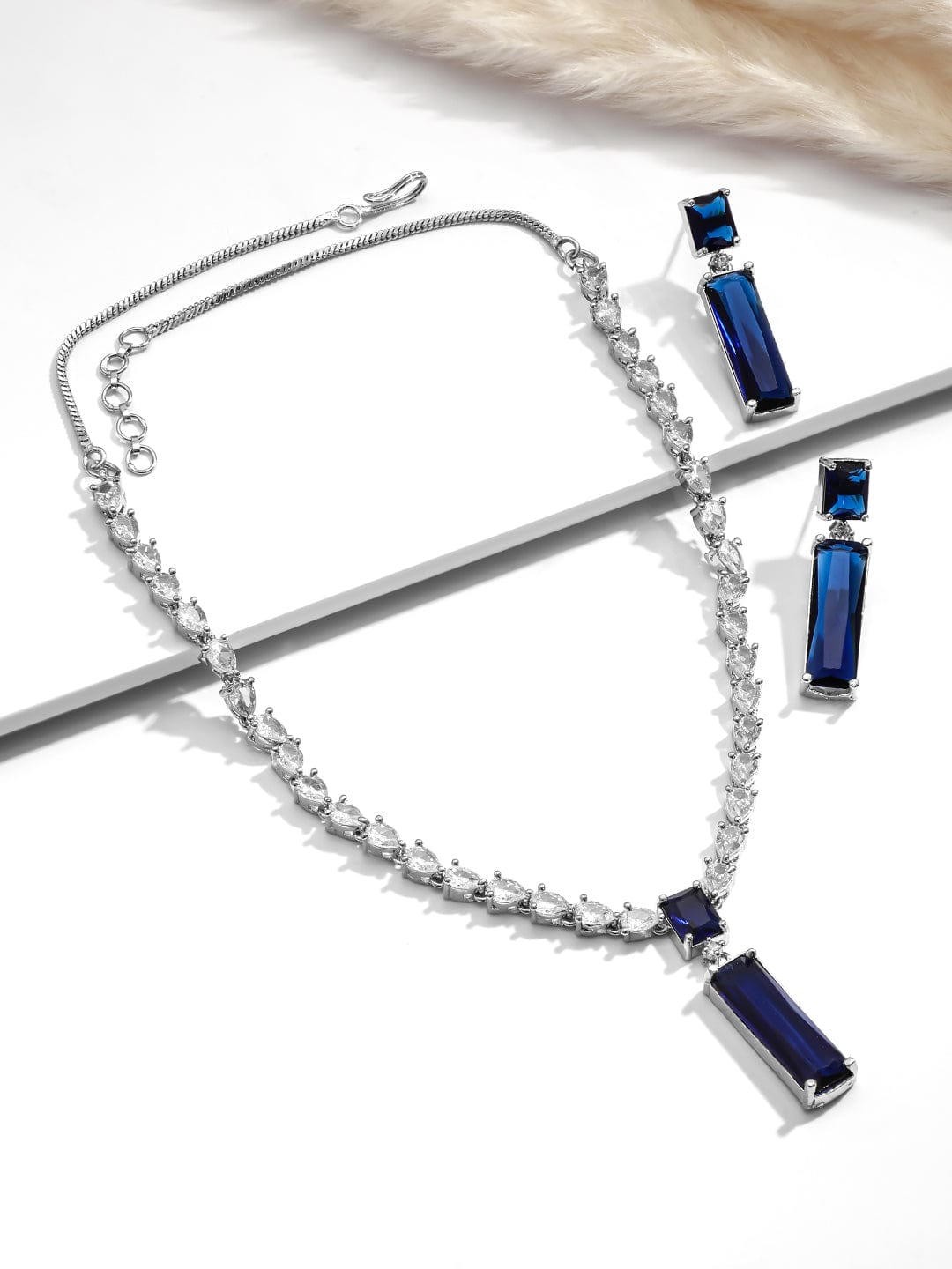rhodium-plated-cz-blue-stone-pendant-set-pendant-and-earrings-36940826378414.jpg