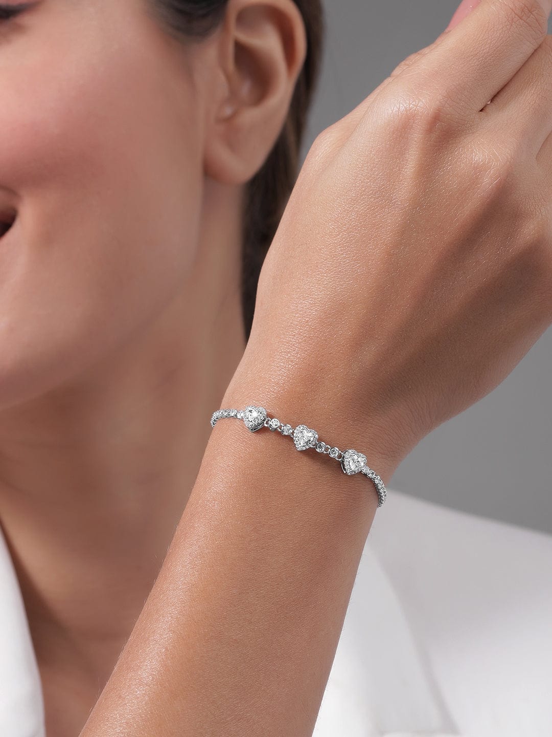 rhodium-plated-cz-studded-heart-charm-bracelet-with-adjustable-chain-bracelet-36940858327214.jpg