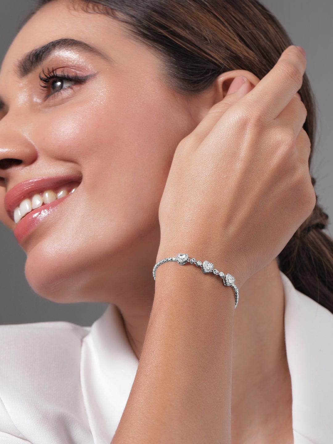 rhodium-plated-cz-studded-heart-charm-bracelet-with-adjustable-chain-bracelet-36940858359982.jpg