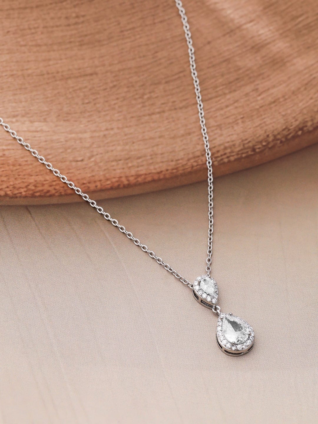 rhodium-plated-cz-studded-teardrop-necklace-set-pendant-and-earrings-36940824150190.jpg