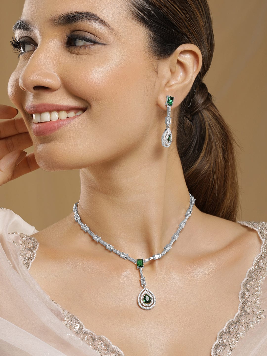 rhodium-plated-emerald-teardrop-pendant-necklace-set-with-ad-cubic-zirconia-studded-pendant-and-earrings-37860408197294.jpg
