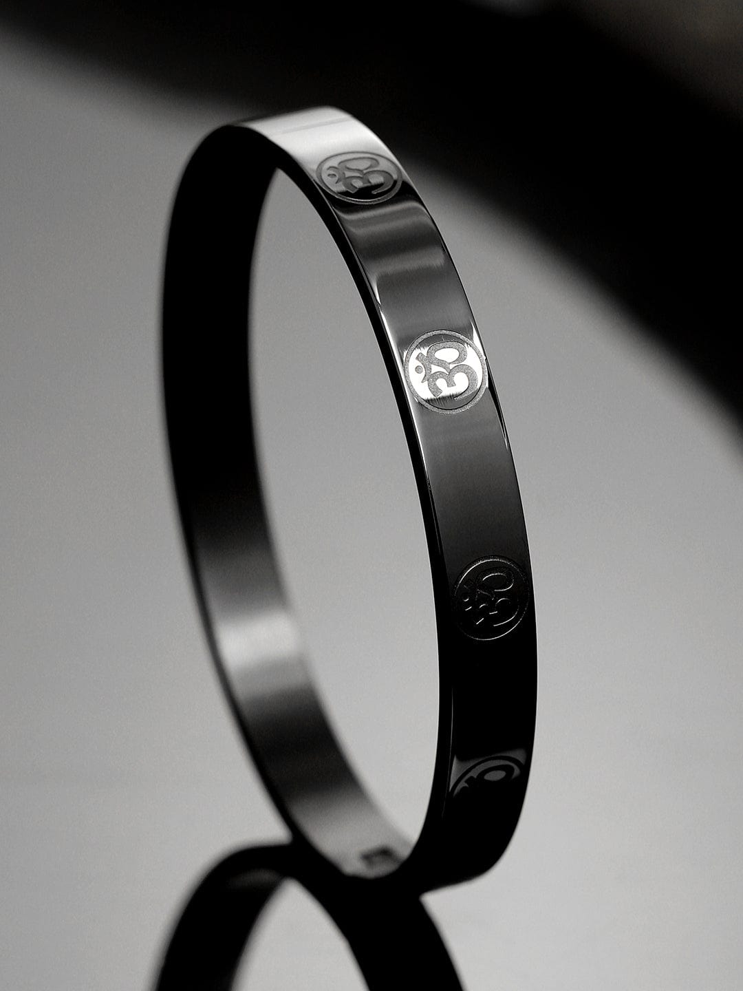 roadster-black-stainless-steel-om-symbol-engraved-statement-bracelet-for-men-bracelets-1158545765.jpg