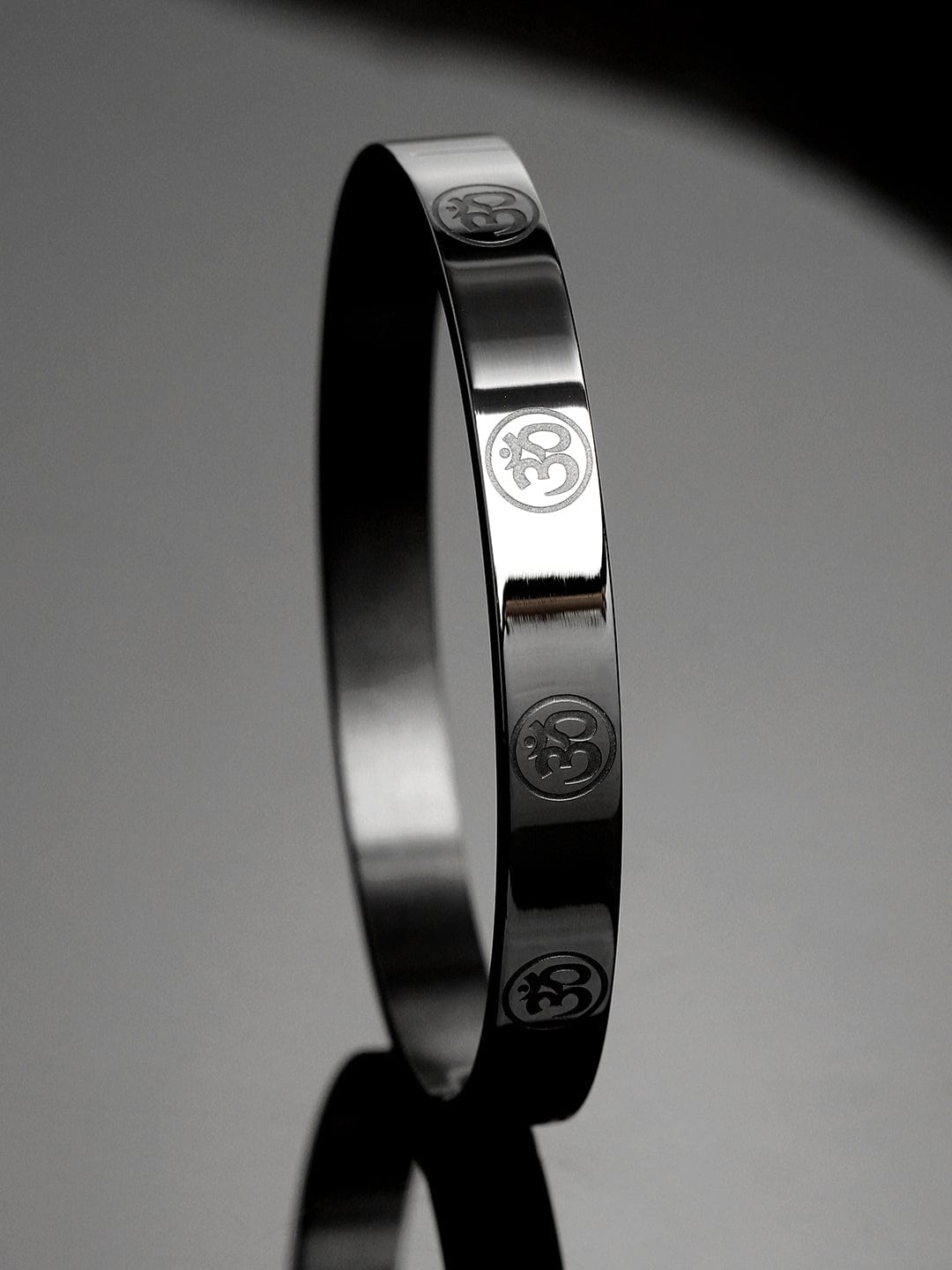 roadster-black-stainless-steel-om-symbol-engraved-statement-bracelet-for-men-bracelets-1158545766.jpg