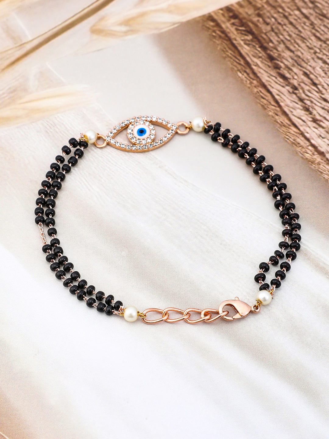 rubans-18k-rose-gold-plated-evil-eye-hand-mangalsutra-magalsutra-bracelet-37345048494254.jpg