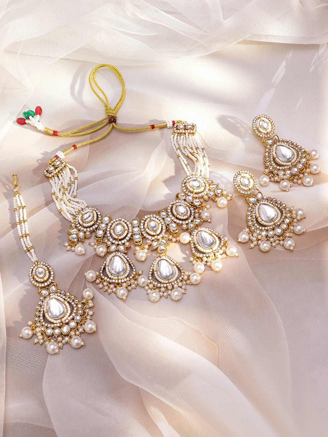 rubans-22k-gold-plated-handcrafted-white-kundan-studded-pearl-beaded-bridal-jewellery-set-with-earrings-maangtikka-necklace-sets-1182500323.jpg