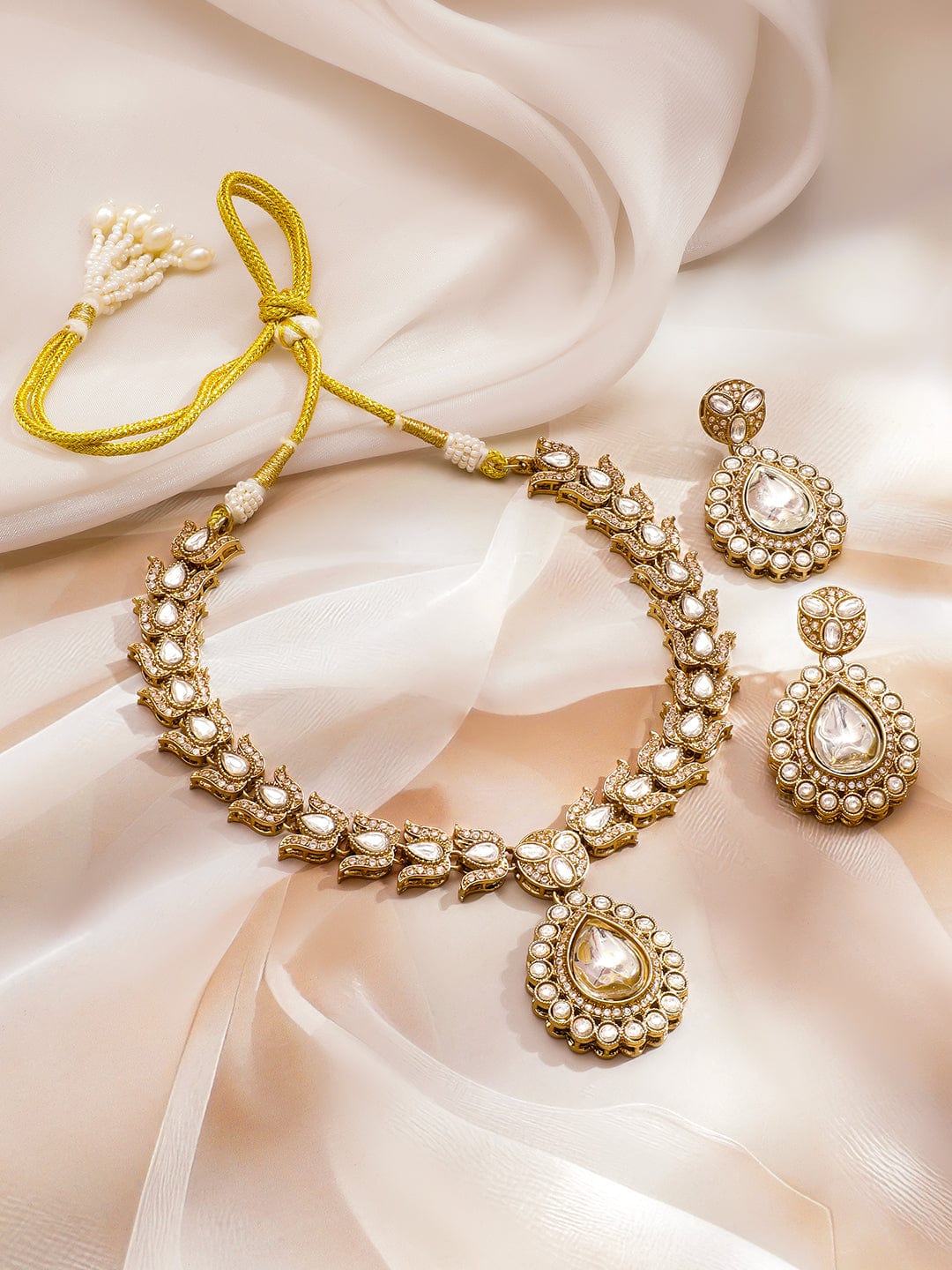rubans-22k-gold-plated-white-kundan-cubic-zirconia-stone-studded-necklace-set-necklaces-necklace-sets-1184214061.jpg