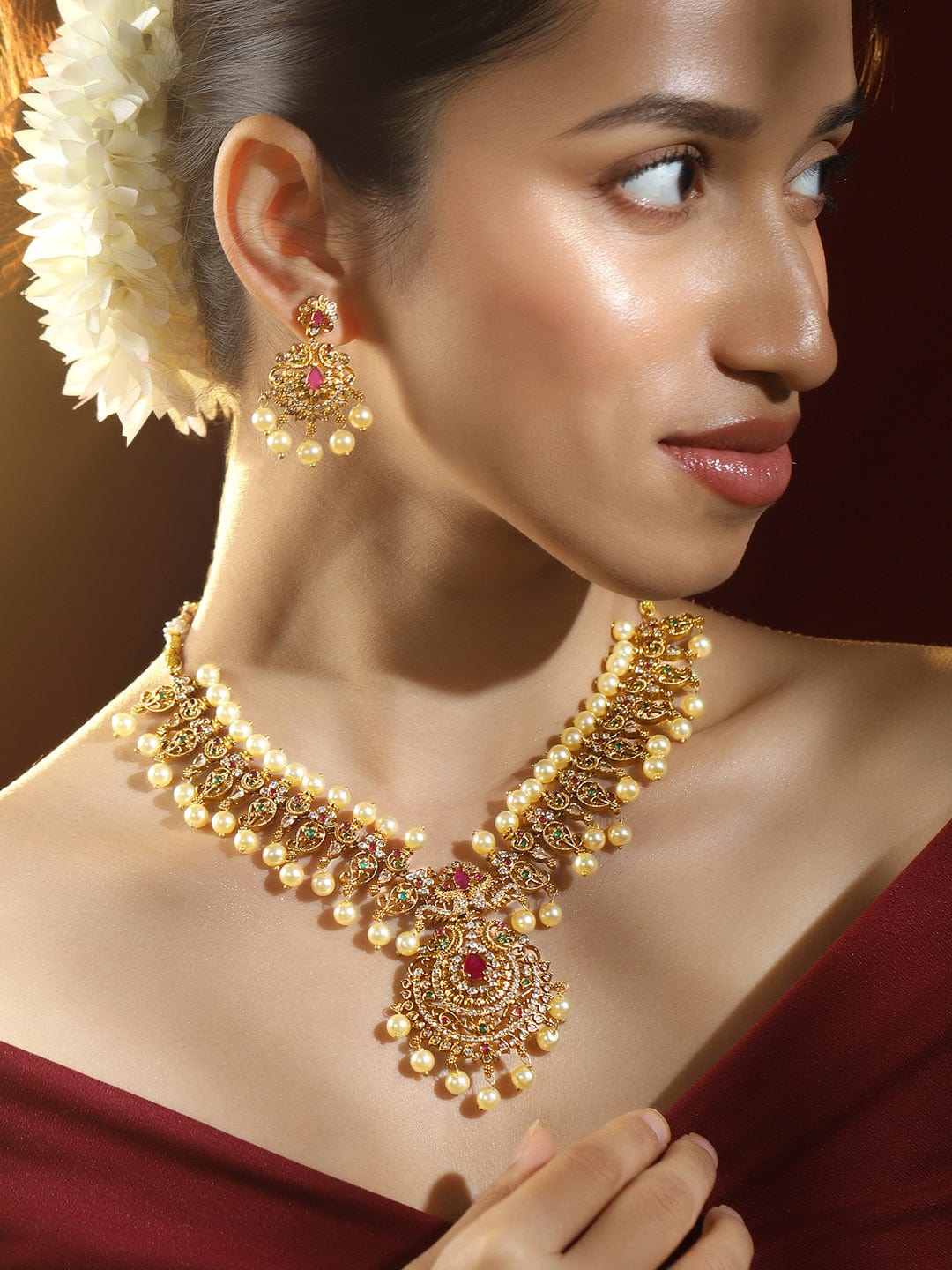 rubans-24k-gold-plated-medium-length-temple-jewellery-set-with-ruby-pink-emerald-green-white-cubic-zirconia-pearl-beads-for-women-necklace-set-1147272130.jpg