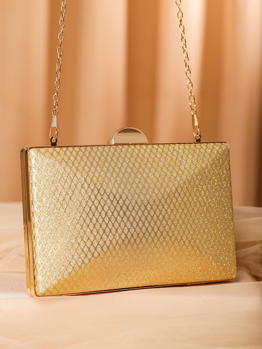 rubans-24k-gold-shimmery-glossy-box-clutch-with-luxe-textured-finish-chain-clutches-1127441115.jpg