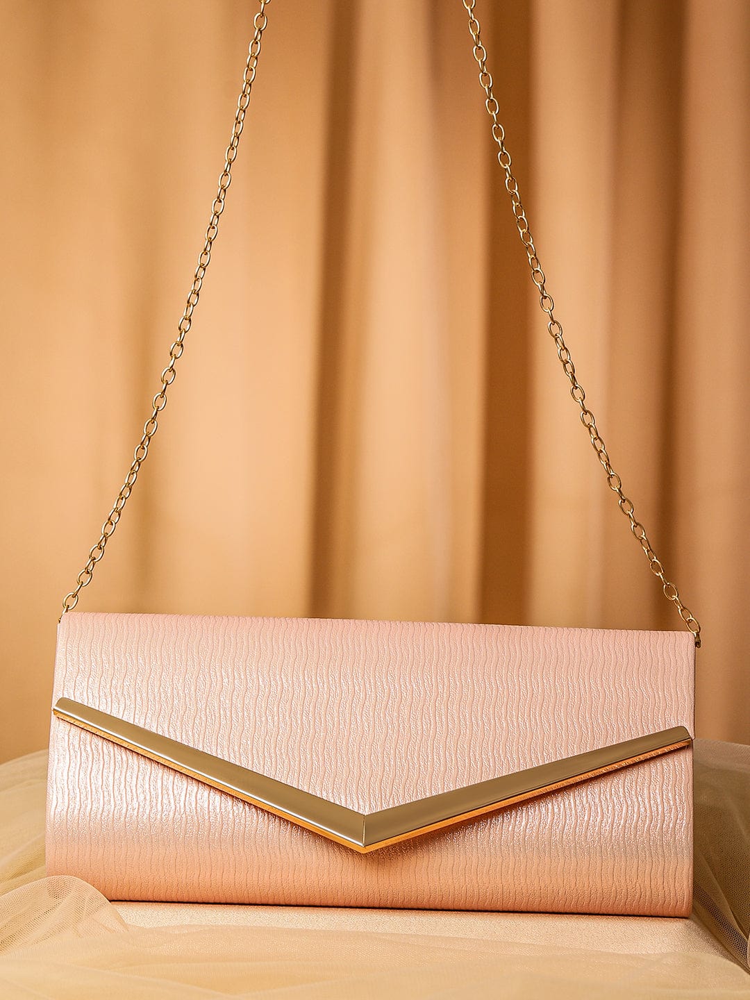 rubans-blush-pink-shimmery-glossy-envelope-clutch-with-24k-gold-tone-chevron-accent-clutches-1127441119.jpg