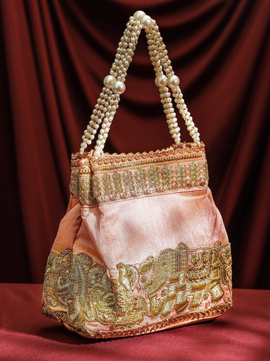 rubans-handcrafted-peach-pink-silk-potli-bag-with-pearl-handle-gold-embroidered-elephant-motif-handbag-wallet-accessories-clutche-1158545762.jpg