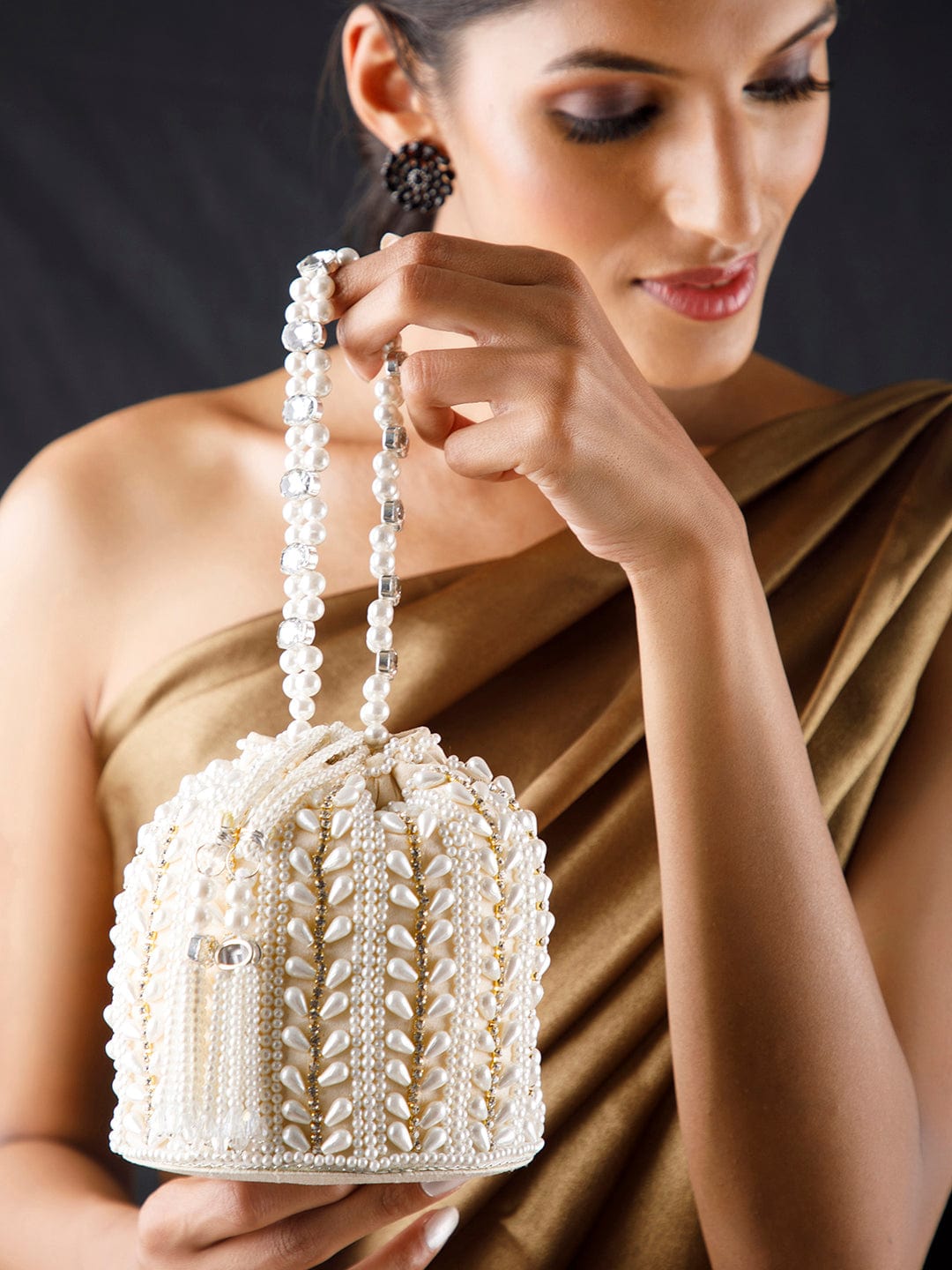 Off White Coloured Potli Bag With Golden Embroided Design And Pearls. - Off White