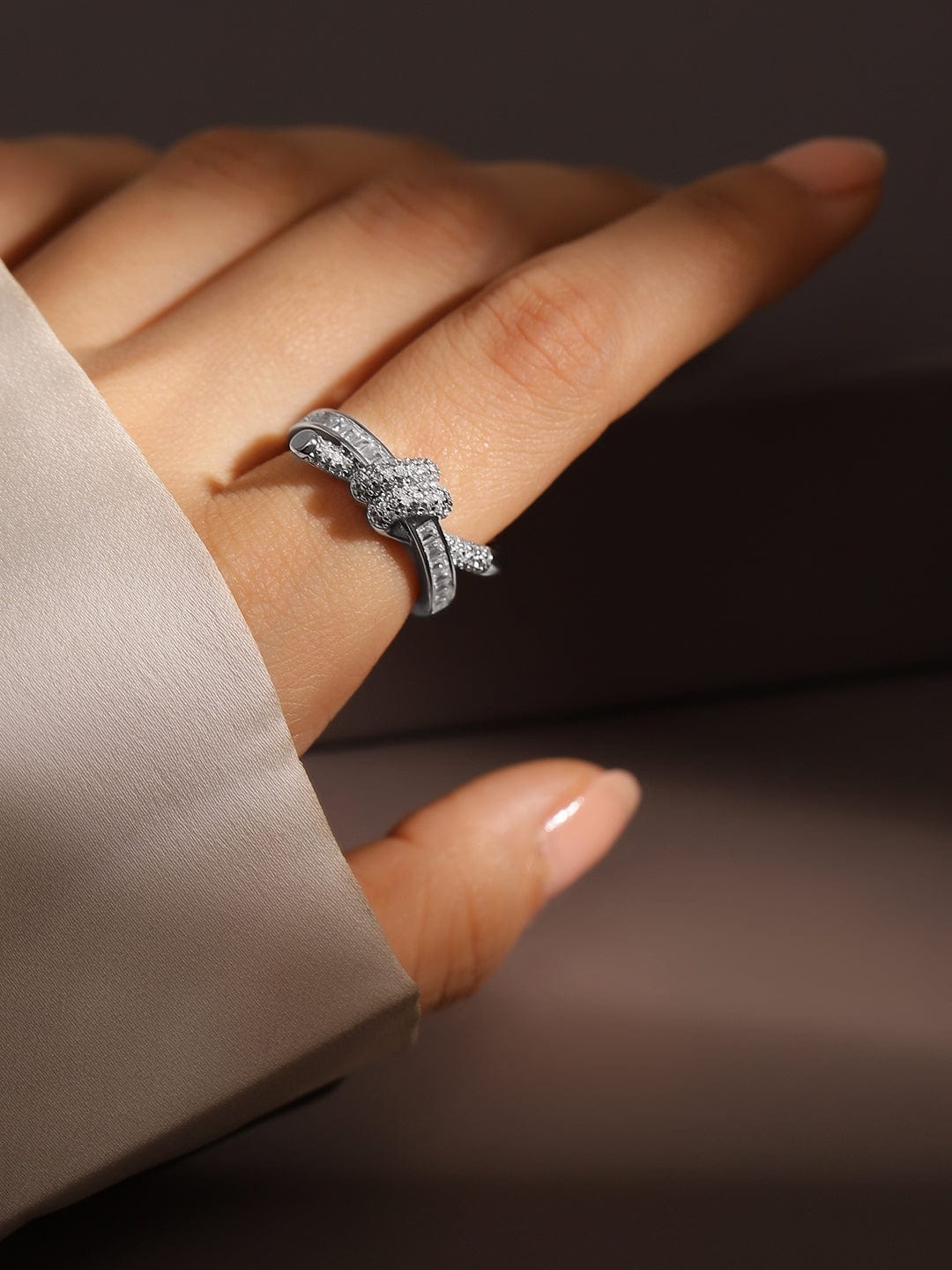 rubans-rhodium-plated-baguette-pave-cubic-zirconia-studded-knot-design-openable-ring-finger-ring-1125745989.jpg
