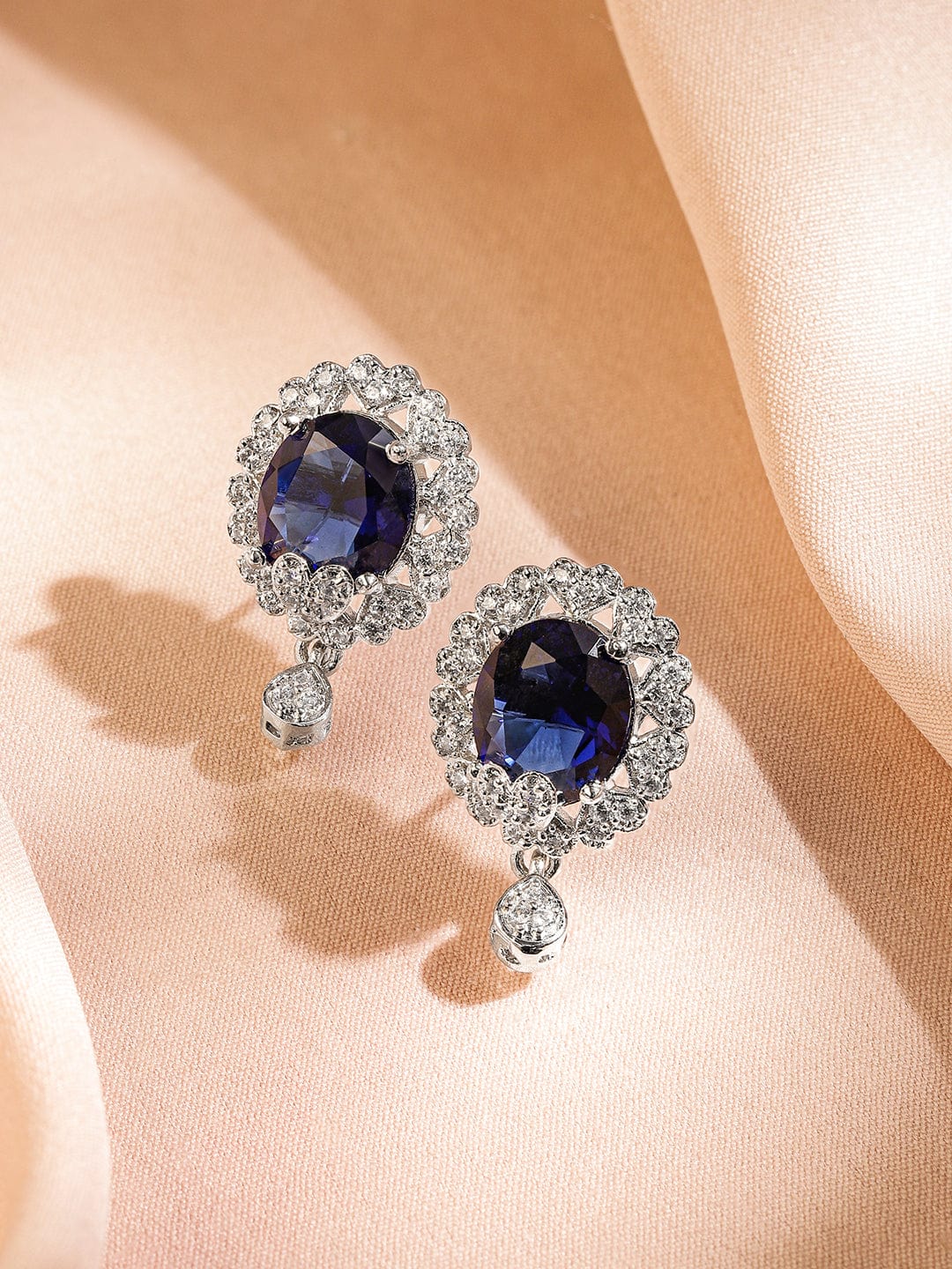 rubans-rhodium-plated-blue-sapphire-white-cubic-zirconia-studded-oval-statement-earrings-with-drop-detailing-stud-earrings-1176995463.jpg