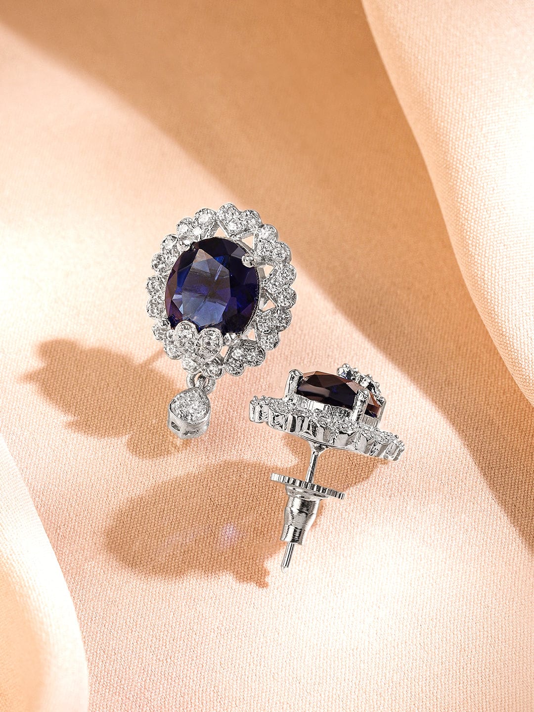 rubans-rhodium-plated-blue-sapphire-white-cubic-zirconia-studded-oval-statement-earrings-with-drop-detailing-stud-earrings-1176995464.jpg