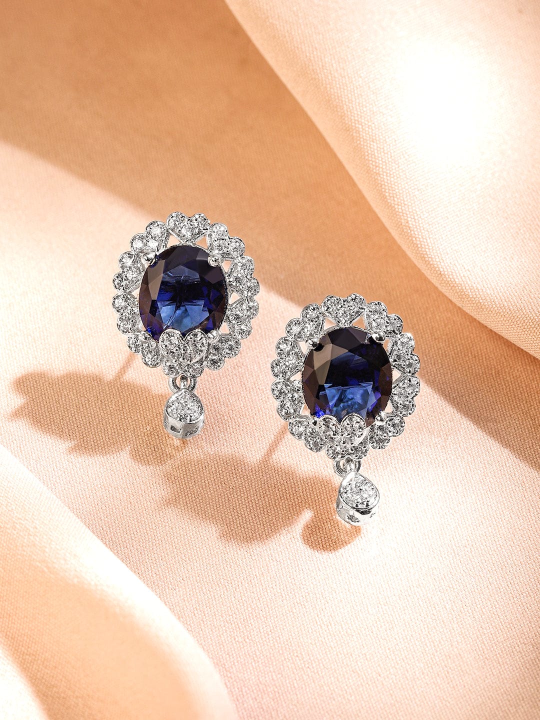rubans-rhodium-plated-blue-sapphire-white-cubic-zirconia-studded-oval-statement-earrings-with-drop-detailing-stud-earrings-1176995465.jpg