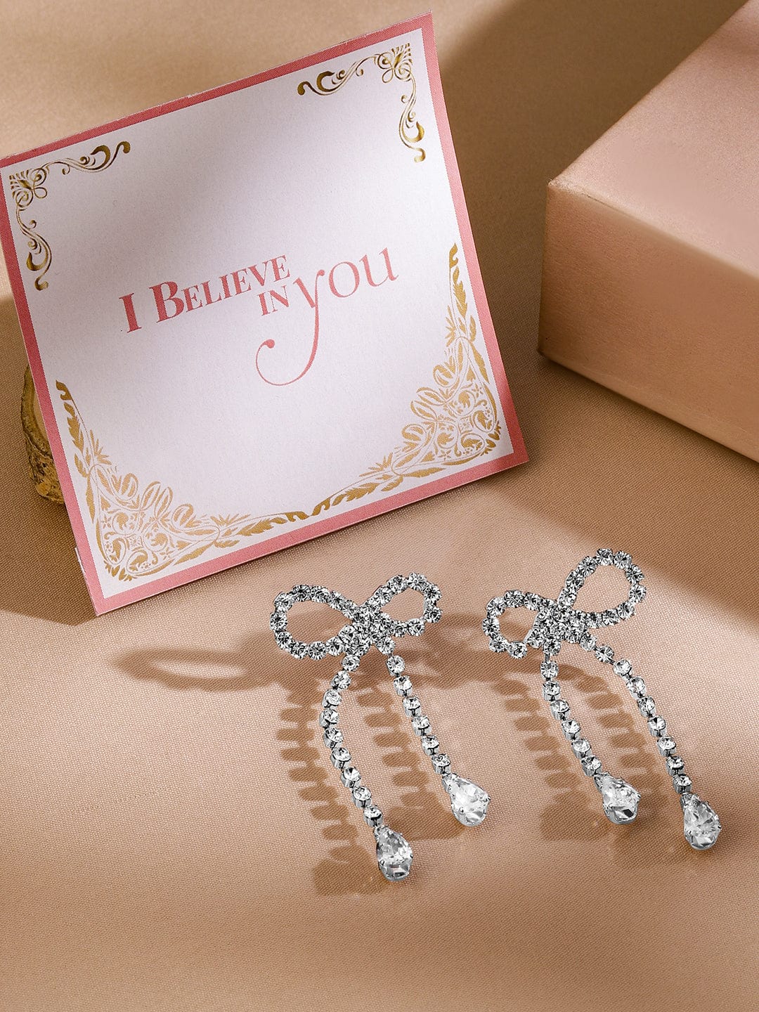 rubans-rhodium-plated-cubic-zirconia-bow-drop-earrings-earrings-1127636937.jpg