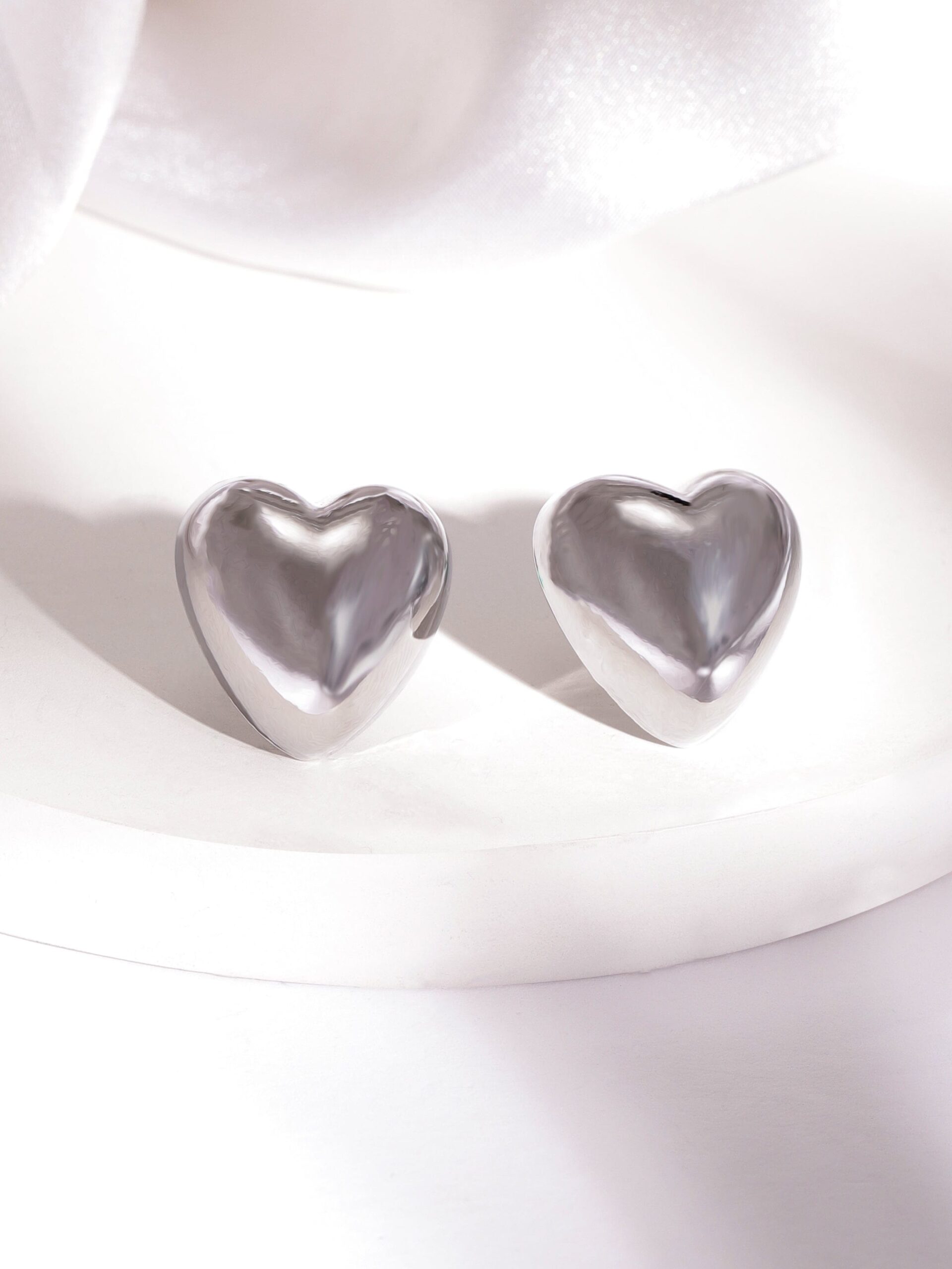 rubans-rhodium-plated-heart-shaped-stud-earrings-with-sleek-silver-tone-finish-stud-earrings-37673784901806.jpg