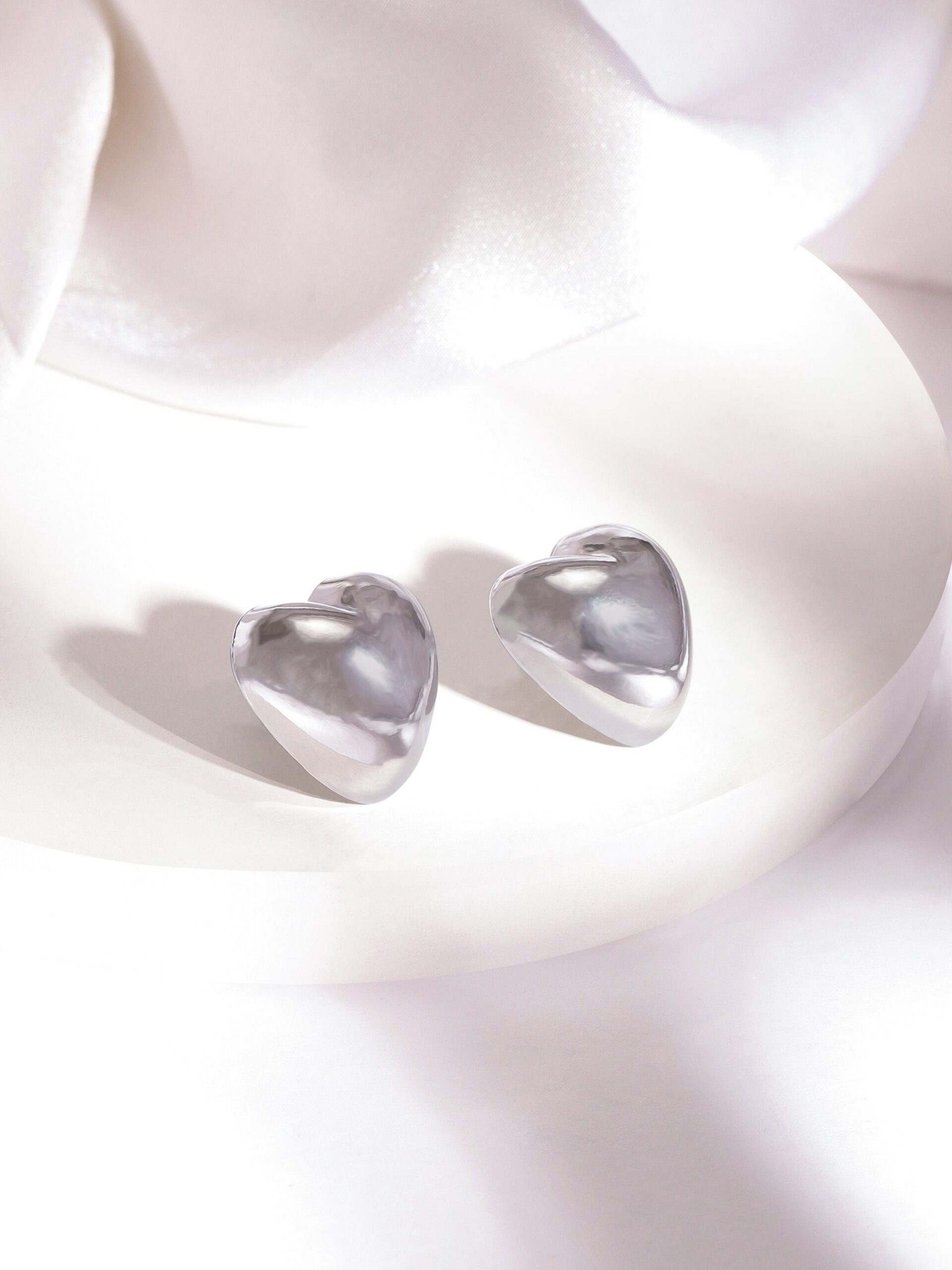rubans-rhodium-plated-heart-shaped-stud-earrings-with-sleek-silver-tone-finish-stud-earrings-37673784967342.jpg