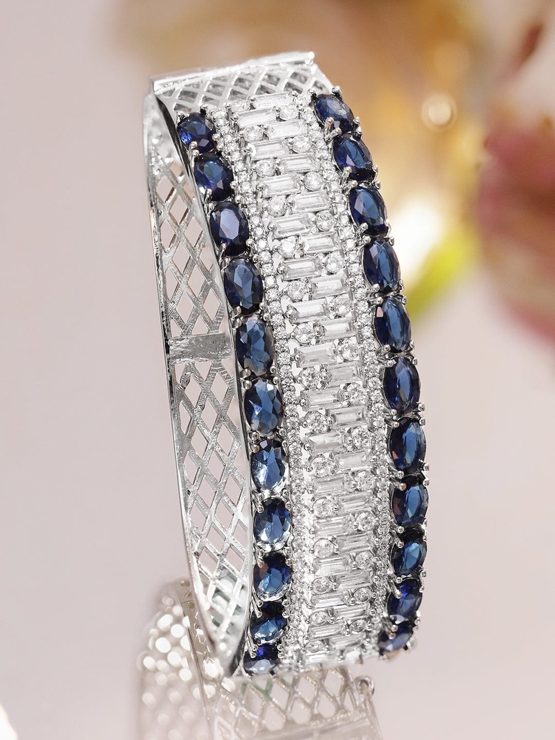 Rhodium-Plated Luxe Statement Bracelet with Blue Sapphire Stones & Cubic Zirconia Detailing
