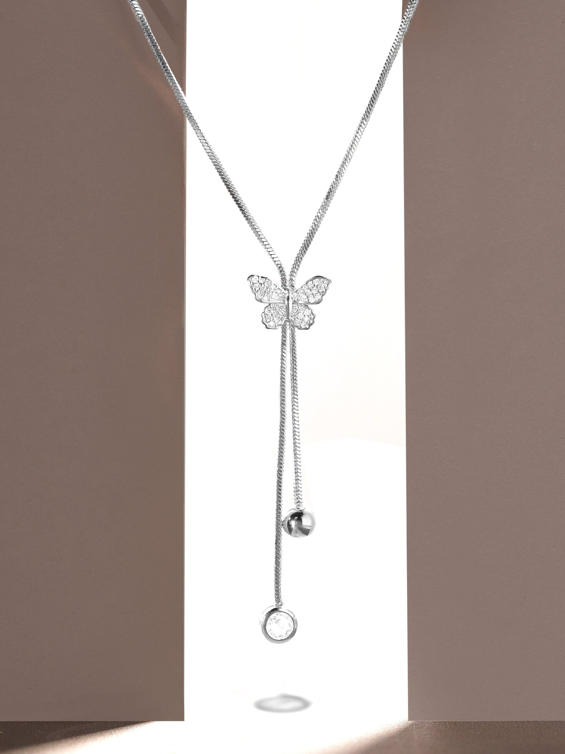 Rhodium Plated, Minimal Chain Butterfly Motif Zircons Studded Drop Necklace. - Silver