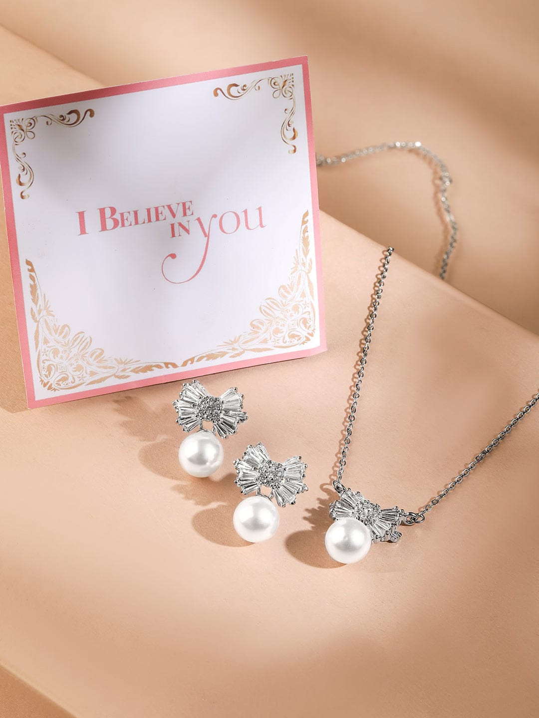 rubans-rhodium-plated-pearl-and-crystal-bow-pendant-necklace-and-earrings-necklace-chain-1143856230.jpg