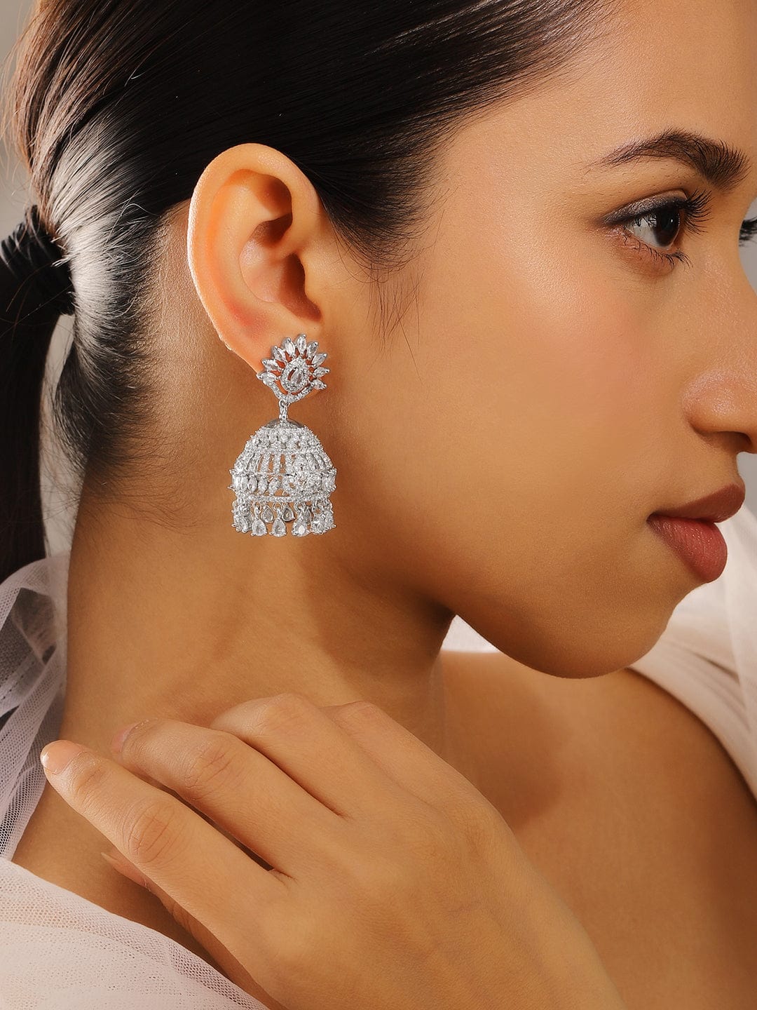 rubans-rhodium-plated-white-cubic-zirconia-studded-statement-jhumka-earrings-for-women-earrings-1143857548.jpg