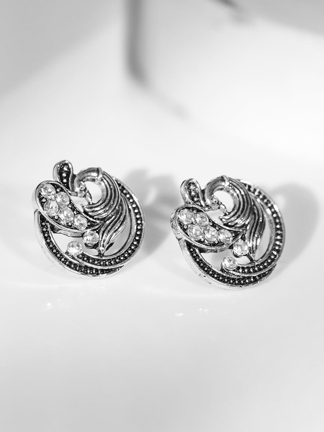 rubans-silver-plated-american-diamond-studded-peacock-shaped-studs-earrings-earrings-1166398370.jpg
