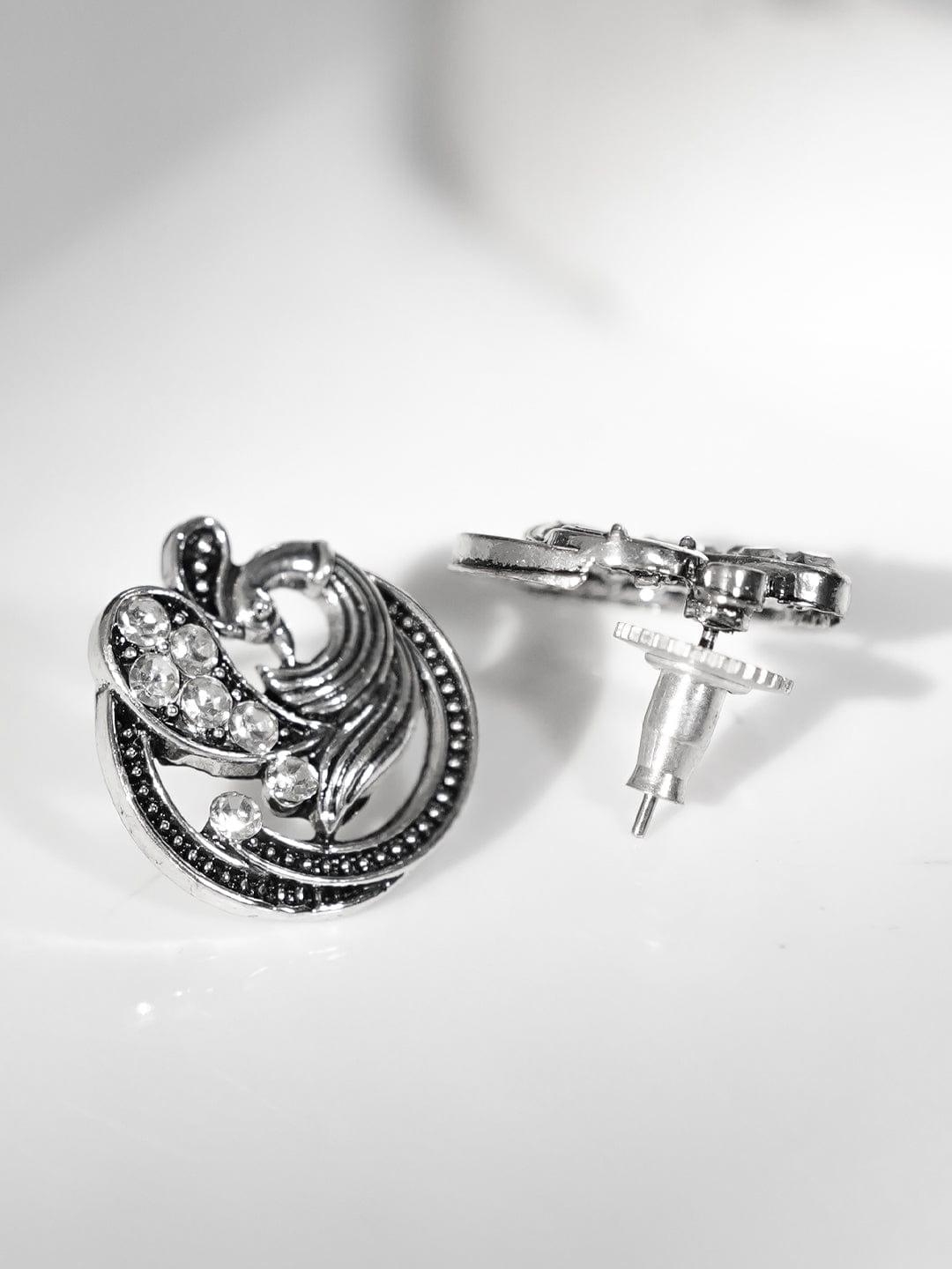 rubans-silver-plated-american-diamond-studded-peacock-shaped-studs-earrings-earrings-1166398373.jpg