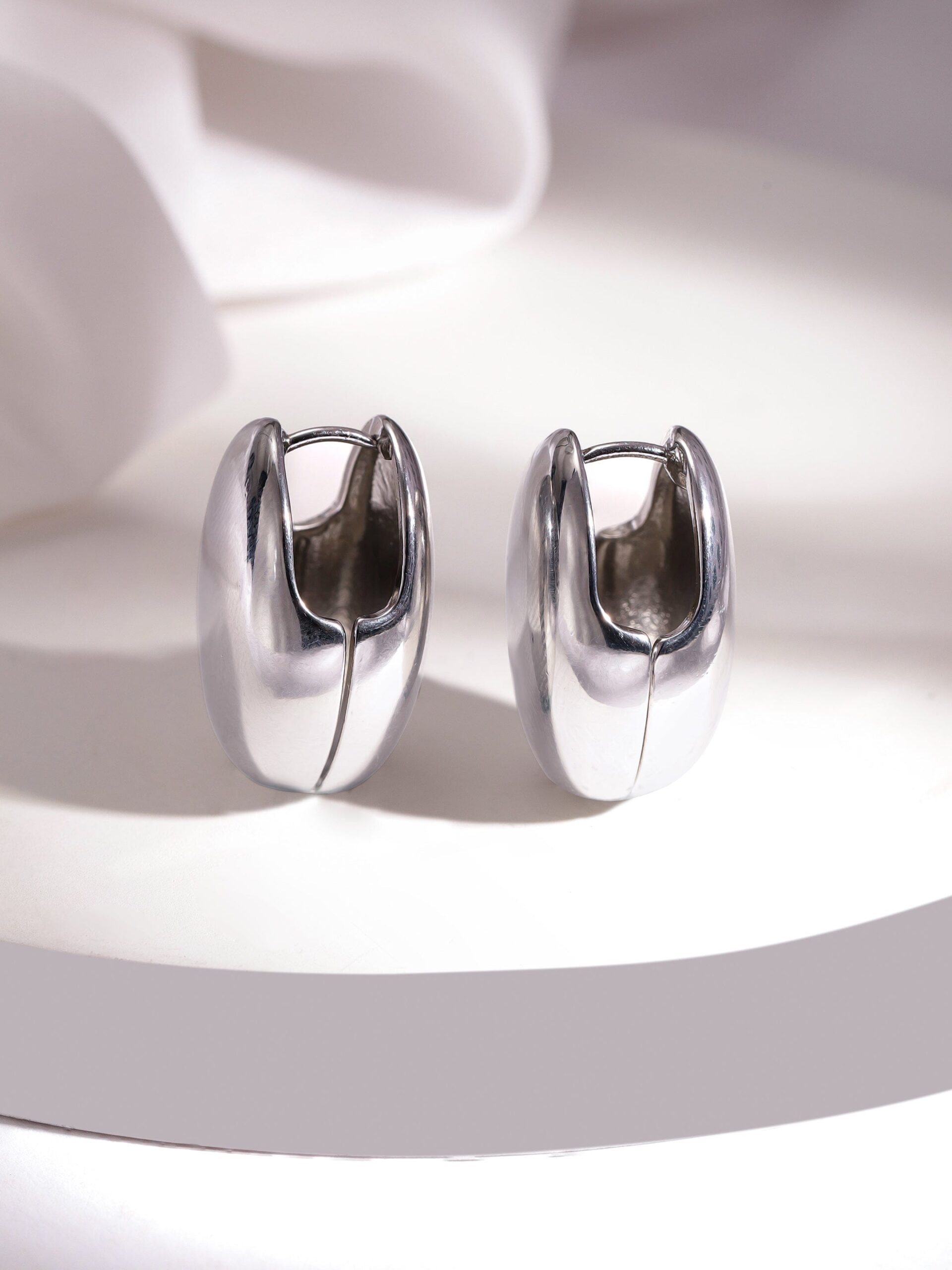 rubans-silver-plated-polished-oval-clip-on-earrings-for-a-sleek-minimalist-look-stud-earrings-1143856633.jpg